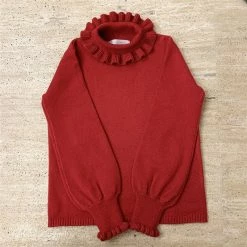 Kinky Cloth Top & Tees Ruffled Turtleneck Knit Sweater